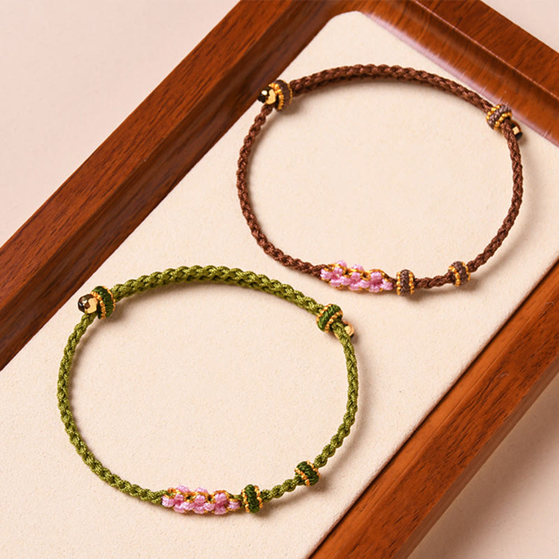 Pulsera de cuerda trenzada con protección de flor de melocotón hecha a mano con Buddha Stones