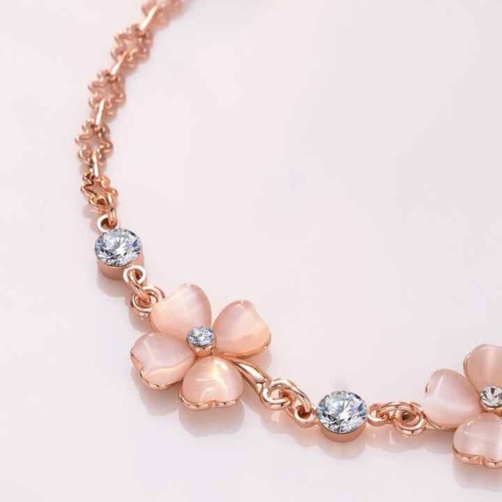 Pulsera de cadena de amor con trébol de cuatro hojas y cristal rosa con Buddha Stones