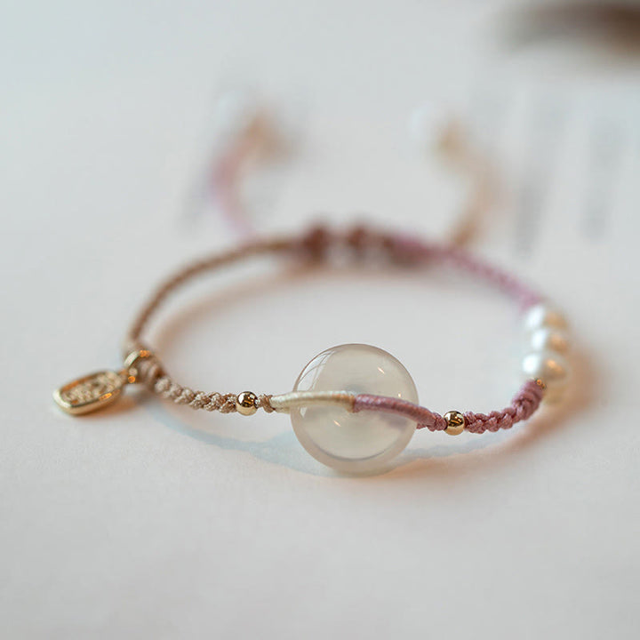 Pulsera de hilo positivo con hebilla de paz redonda de calcedonia con Buddha Stones