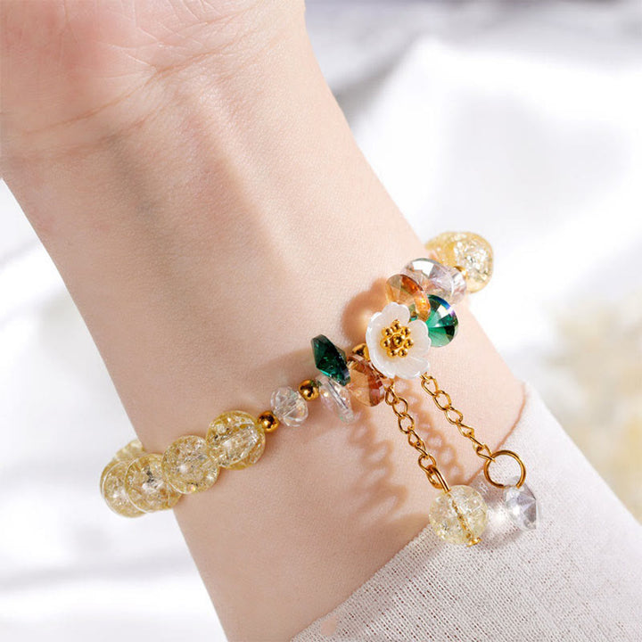 Pulsera de cuentas de cristal con dije de flor de diseño simple con Buddha Stones