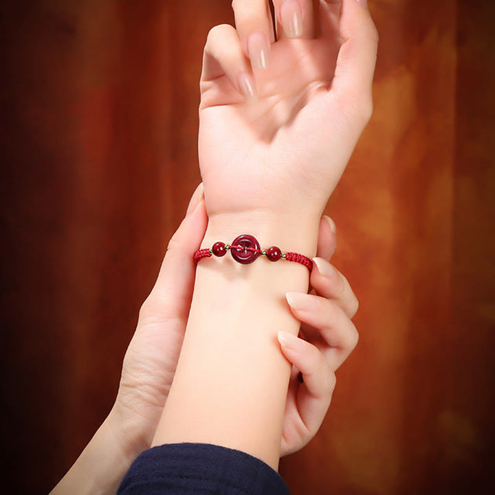 Pulsera de cuerda de bendición con hebilla de paz de cinabrio natural con Buddha Stones