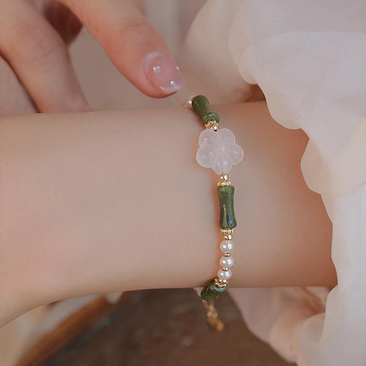 Pulsera de la paz con perlas y ágata, flor de bambú, peridoto y Buddha Stones