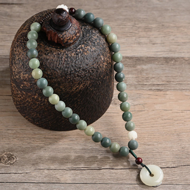 Pulsera de doble envoltura con hebilla de paz y jade de loto, semilla de Bodhi cian