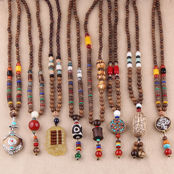 Colgante de collar de protección de elefante de ágata de semilla Bodhi de madera de wengué tibetano con Buddha Stones