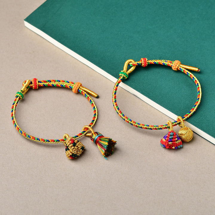 Pulsera con dije de bola dorada Zongzi hecha a mano con cuerda colorida y Buddha Stones
