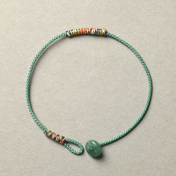 Pulsera de cuerda trenzada de protección de la suerte de aventurina verde hecha a mano tibetana con Buddha Stones
