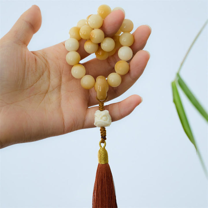 Buddha Stones Bodhi Natural Marfil Fruta Bailando León Encanto Armonía Borla Muñeca Mala