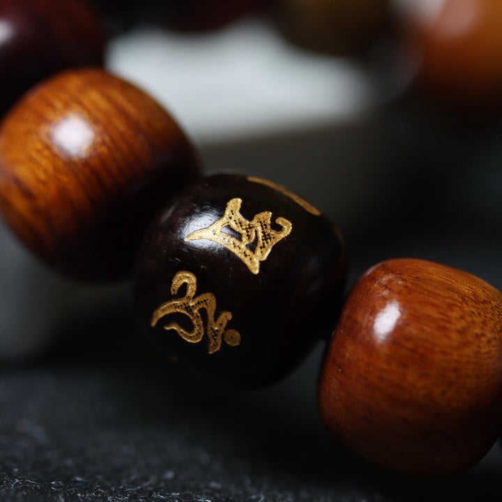 Pulsera de pureza Om Mani Padme Hum de varias maderas del Tíbet con Buddha Stones