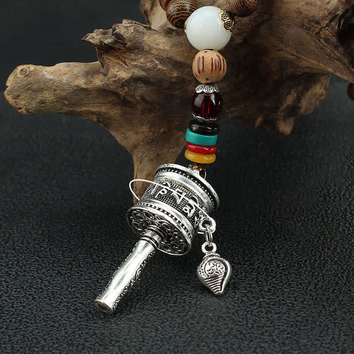 Buddha Stones tibetano Om Mani Padme Hum rueda de oración rotación Vajra collar de madera colgante - image 16