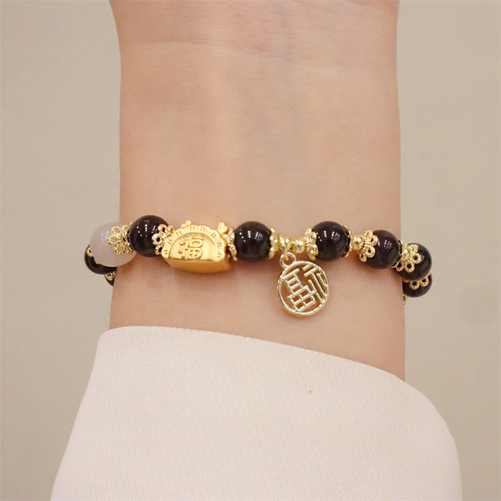 Buddha Stones Año del Dragón Ágata roja Cuarzo fresa Obsidiana negra Jade Granate Perla Cinabrio Bola de masa Dragón Suerte Fu Pulsera con personajes - image 16
