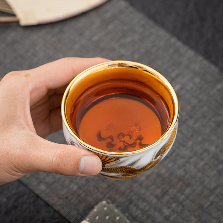 Taza de té de cerámica dorada con Buddha Stones, águila dorada, dragón auspicioso, sol, olas del océano, taza de té de Kung Fu