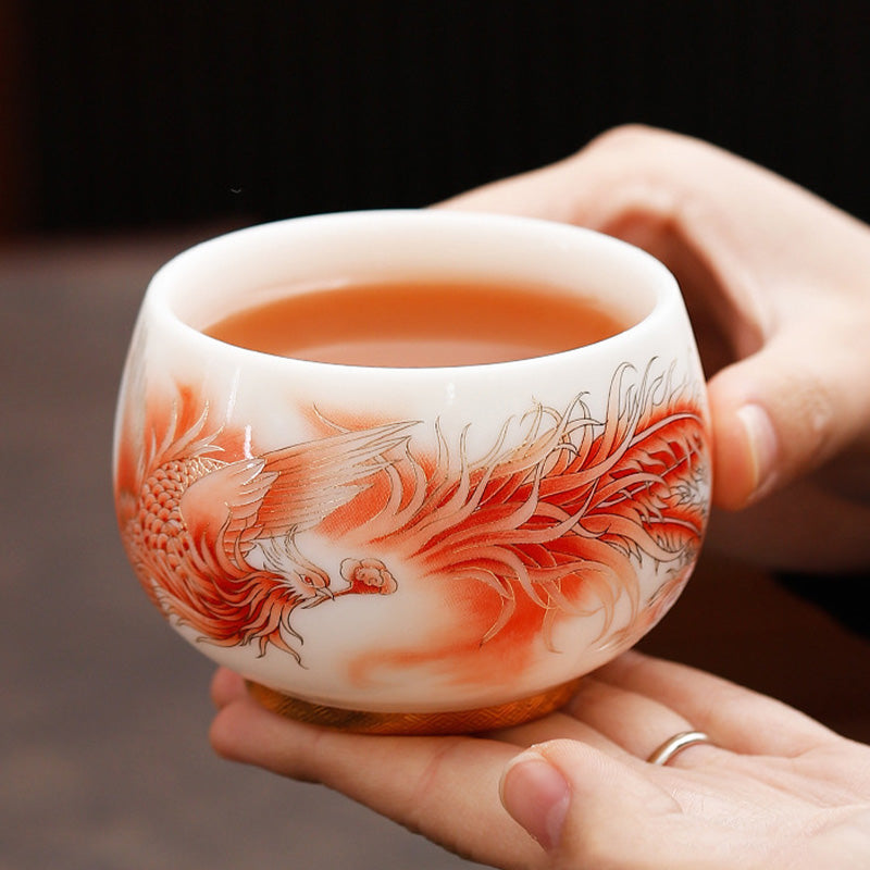Taza de té de cerámica de porcelana blanca Fénix con Buddha Stones, taza de té de Kung Fu