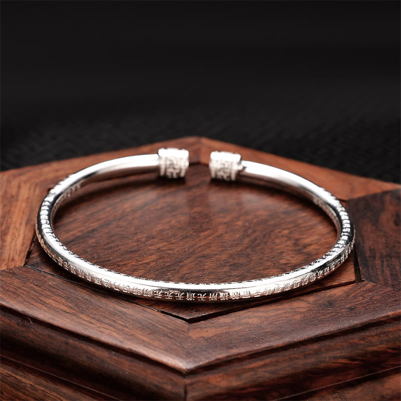 Brazalete de cobre blanco con diseño de esvástica grabado en Sutra del corazón