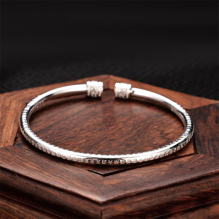 Brazalete de cobre blanco con diseño de esvástica grabado en Sutra del corazón