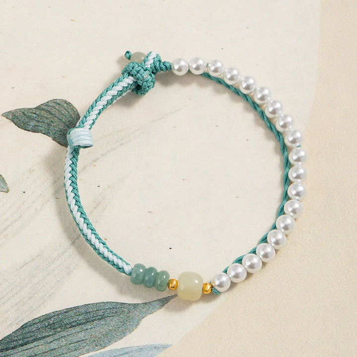 Pulsera de abundancia de perlas de cuerda trenzada de jade hetiano de plata de ley 925 con Buddha Stones
