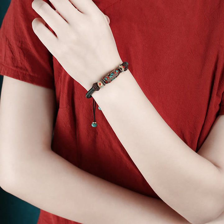 Pulsera trenzada de fuerza Om Mani Padme Hum de turquesa tibetana hecha a mano con Buddha Stones