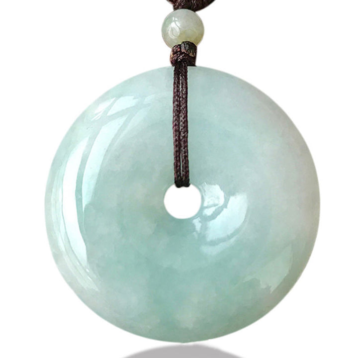 Colgante de collar de suerte con hilo de jade redondo de Buddha Stones