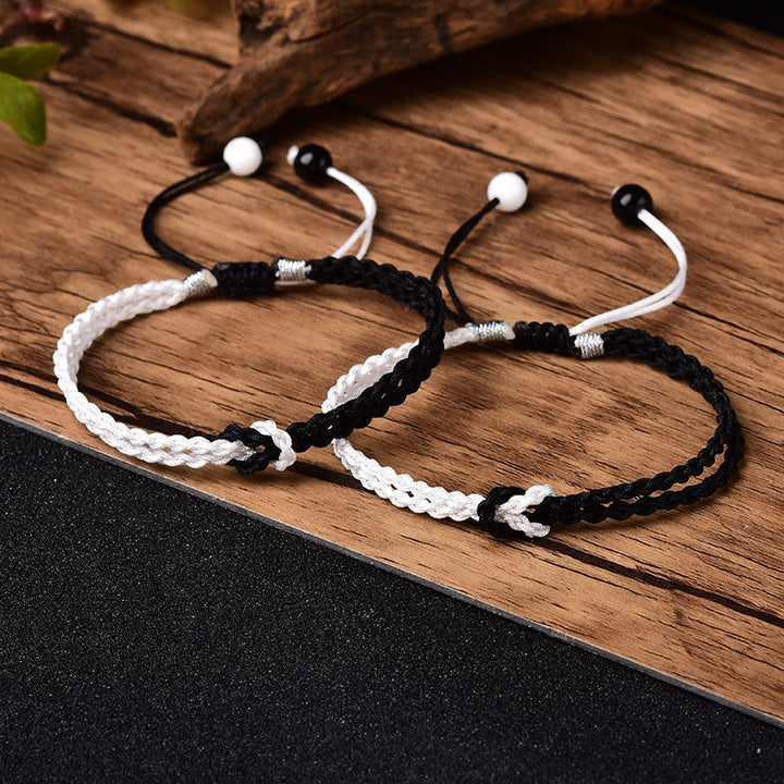 Pulsera curativa trenzada de cuerda blanca y negra hecha a mano con Buddha Stones