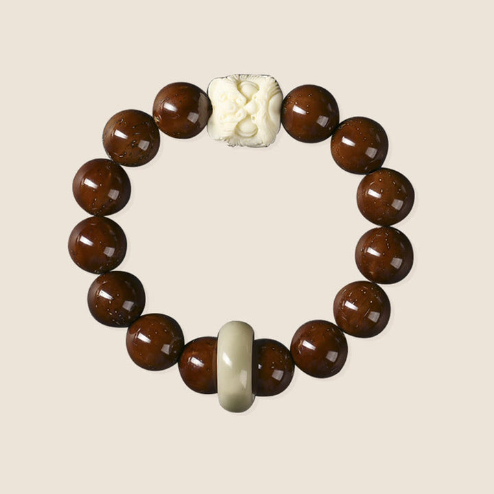 Pulsera de sabiduría de león danzante con semillas de Bodhi moradas con Buddha Stones