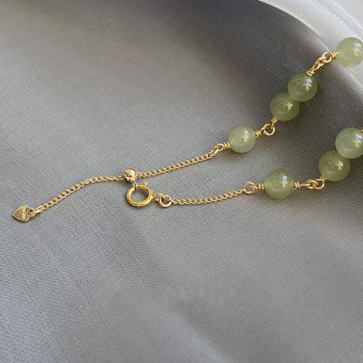 Pulsera de cadena de prosperidad con cuentas de jade hetiano chapada en oro de 14 k