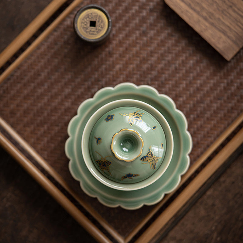 Buddha Stones de porcelana verde, mariposa, flor, salmón, pescado, cerámica, Gaiwan Sancai, taza de té de Kung Fu y platillo con tapa
