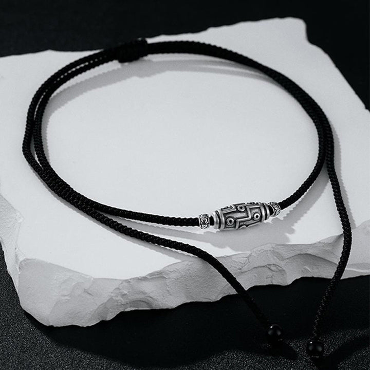 Collar con colgante de cuerda de protección con diseño de cuentas Dzi de nueve ojos de plata de ley 999 con Buddha Stones
