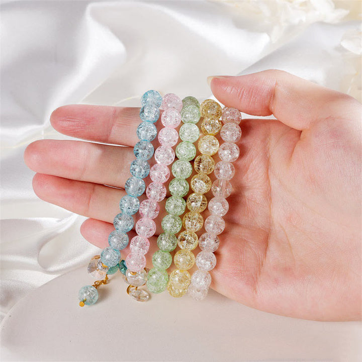Pulsera de cuentas de cristal con dije de flor de diseño simple con Buddha Stones