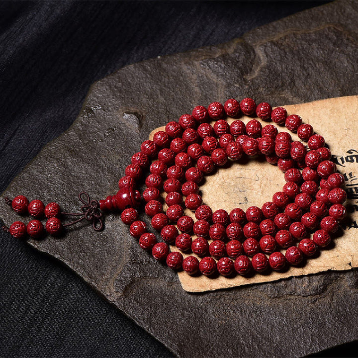 Buddha Stones 108 cuentas Mala cinabrio Om Mani Padme Hum patrón grabado pulsera de bendición