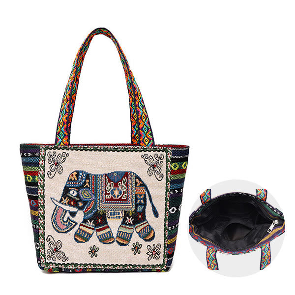 Bolso bandolera de lona de gran capacidad con bordado de mariposa y elefante - image 1
