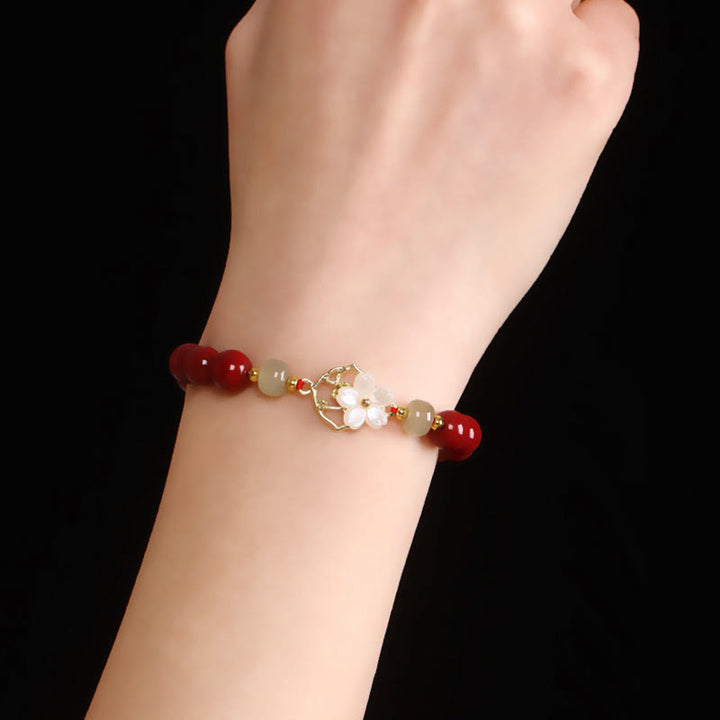 Pulsera de bendición de flores de piedra Tridacna con cuentas de jade cinabrio Natural de Buddha Stones