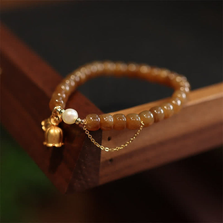 Pulsera con dije de lirio de los valles de jade hetiano natural de plata de ley 925