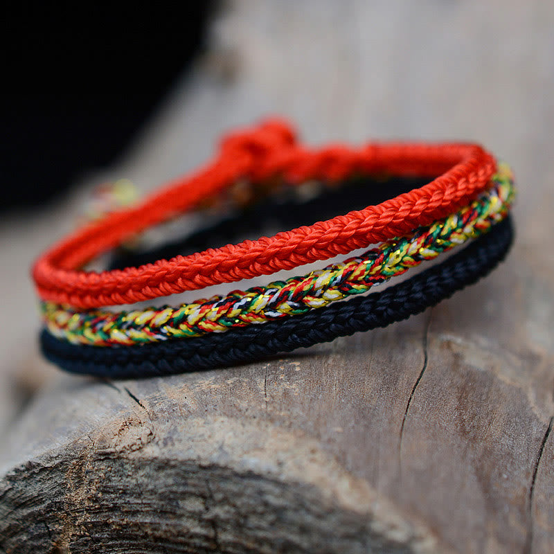 Pulsera de cuerda trenzada con protección de nudo de paz de ocho hilos hecha a mano tibetana con Buddha Stones