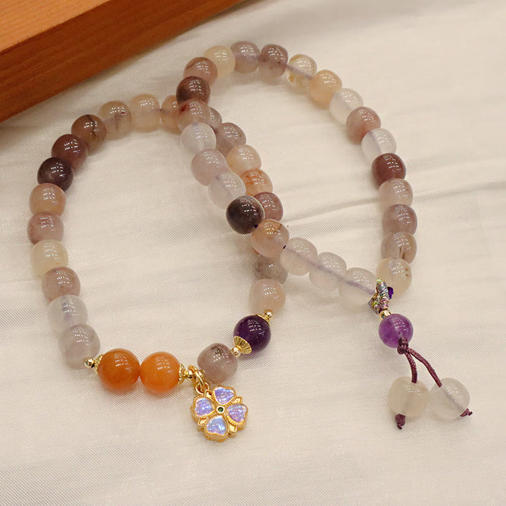 Pulsera de la riqueza del encanto del grano de la flor violeta del jade de la seda dorada púrpura natural de las Buddha Stones