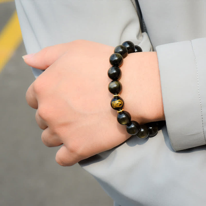Pulsera de protección de la riqueza de obsidiana con brillo dorado del Buda Natal del zodíaco chino