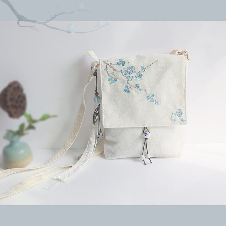 Bolso bandolera de lona con flores de ciruelo bordadas hechas a mano con Buddha Stones