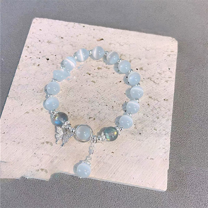 Pulsera de soporte con dije de estrella, mariposa, piedra lunar, ojo de gato, Buddha Stones
