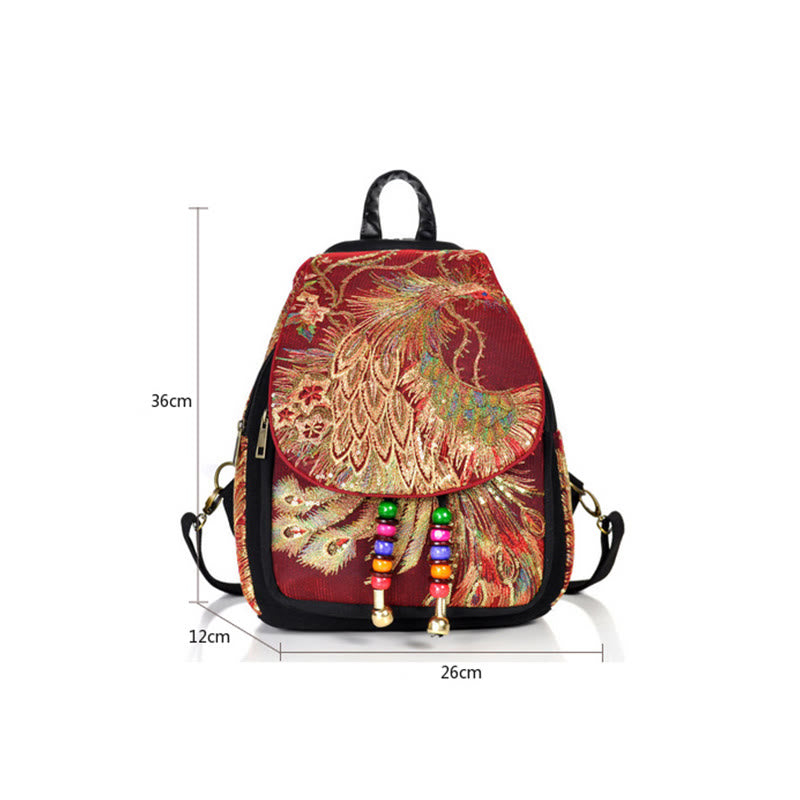 Mochila con borlas de lona con bordado de pavo real