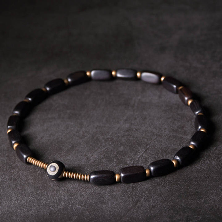 Pulsera de doble envoltura con cuentas Dzi de madera de ébano del Tíbet con Buddha Stones