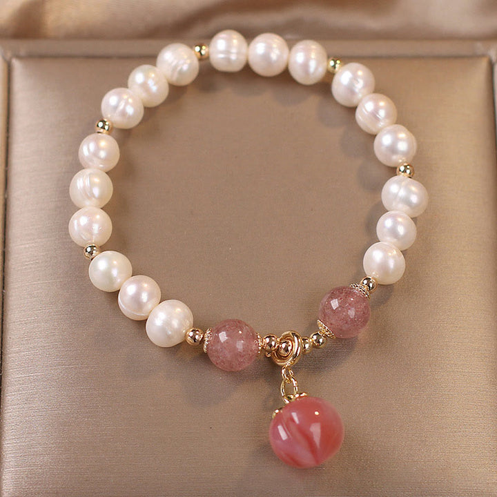 Pulsera con dije de sabiduría de corazón de amor de melocotón de cuarzo de fresa de perlas naturales de Buddha Stones
