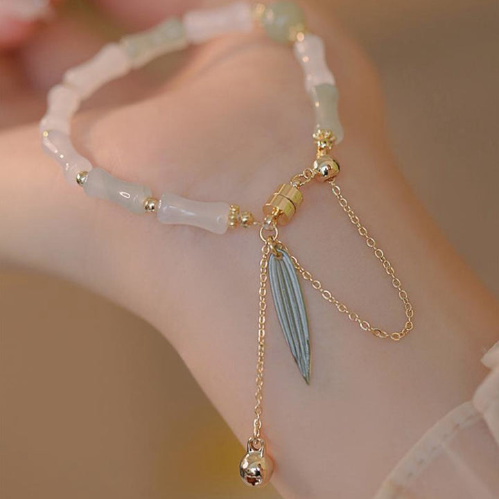 Pulsera de protección de la suerte con hojas de bambú de jade blanco hetiano chapado en oro de 14 Buddha Stones