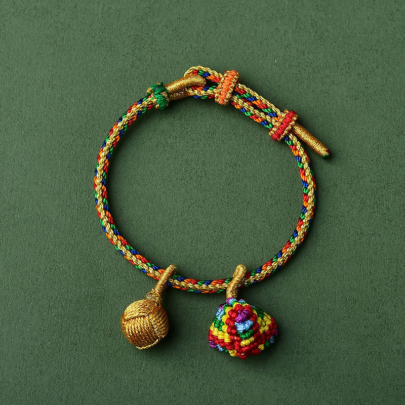 Pulsera con dije de bola dorada Zongzi hecha a mano con cuerda colorida y Buddha Stones