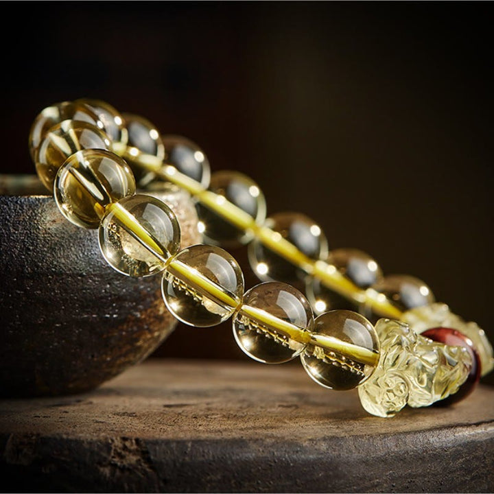 Pulsera de protección de prosperidad de ojo de tigre doble PiXiu de citrino natural de Buddha Stones