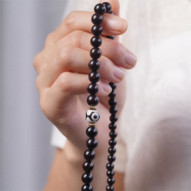 Pulsera de doble envoltura con cuentas Dzi de madera de ébano del Tíbet con Buddha Stones