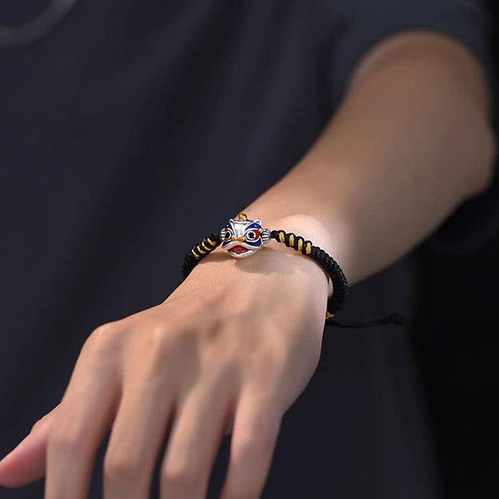 Pulsera de hilo trenzado de la suerte del león danzante hecho a mano con Buddha Stones