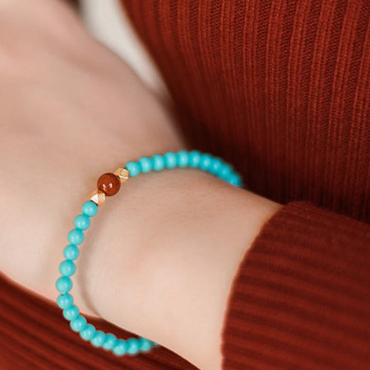 Pulsera de protección con cuentas de ágata roja turquesa de Buddha Stones
