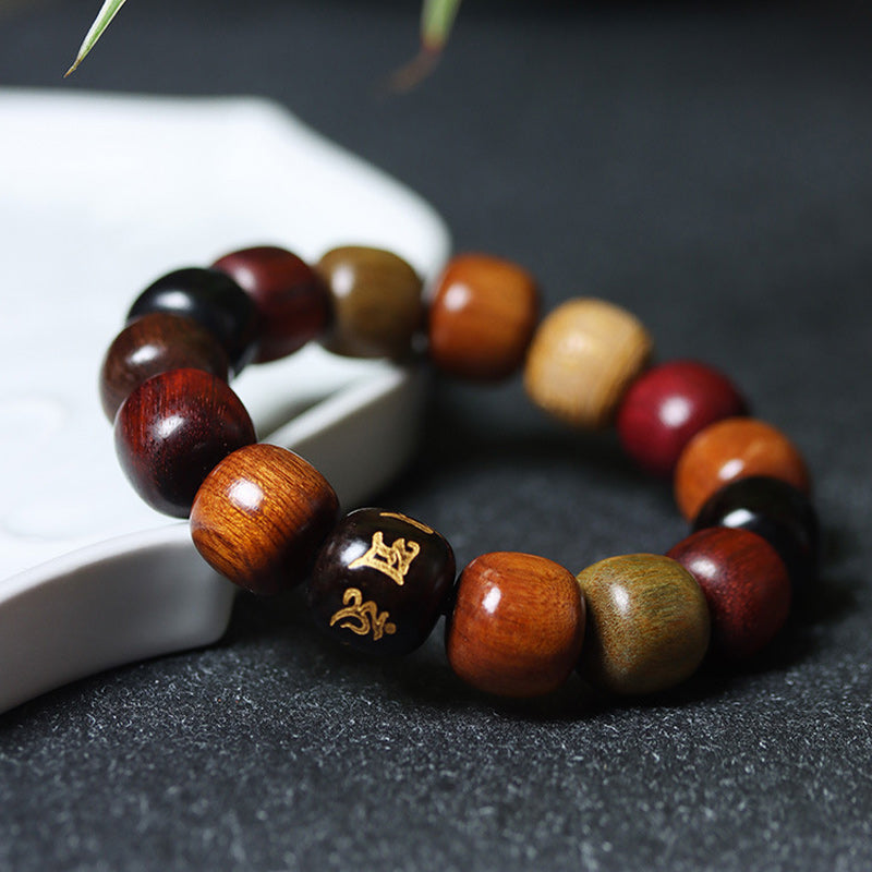Pulsera de pureza Om Mani Padme Hum de varias maderas del Tíbet con Buddha Stones