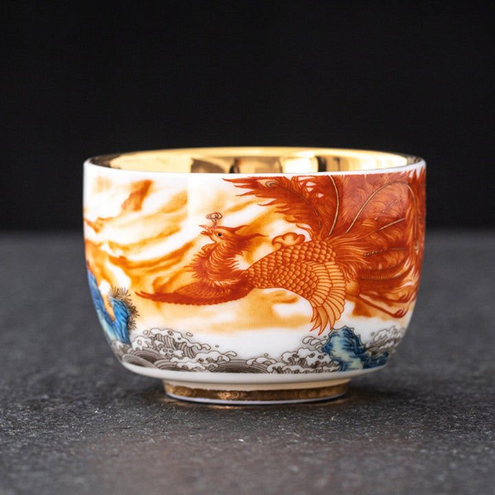 Buddha Stones Dragón Fénix Grulla Sol Océano Olas Taza de té de cerámica dorada Taza de té de Kung Fu 170 ml