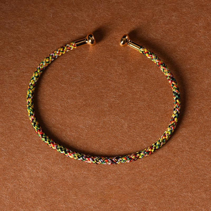 Pulsera de cuerda trenzada de la suerte hecha a mano con diseño simple de Buddha Stones