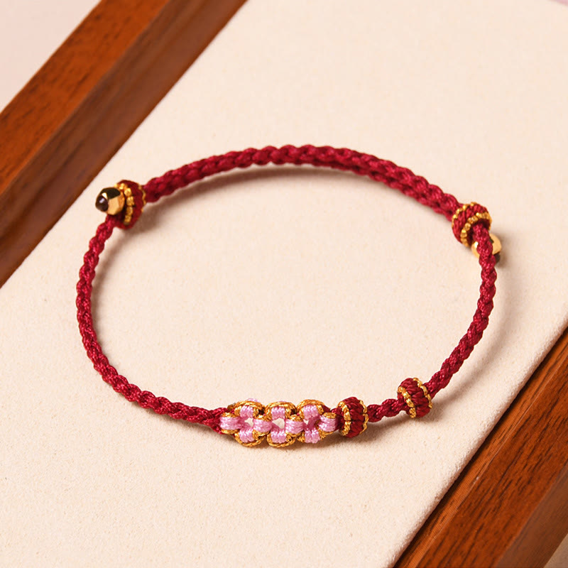 Pulsera de cuerda trenzada con protección de flor de melocotón hecha a mano con Buddha Stones
