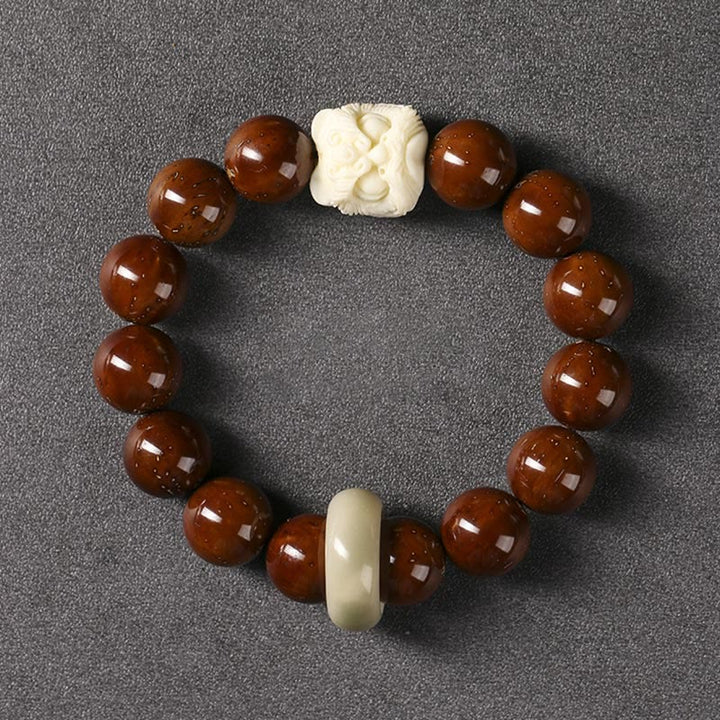 Pulsera de sabiduría de león danzante con semillas de Bodhi moradas con Buddha Stones